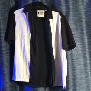 Black and white button down short sleeve shirt.